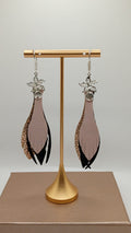 Aretes Estrella de mar · Cobre, negro y piel, tamaño chico, colección Escarlata